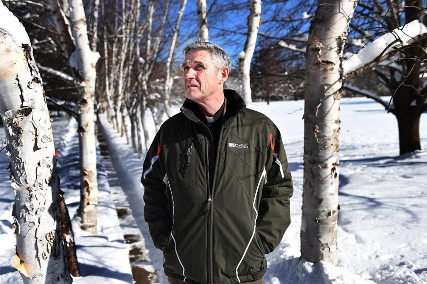 ADVANCE FOR SATURDAY, FEB. 13, 2016 AND THEREAFTER - In this photo taken on Feb. 3, 2016, The Rev. Patrick McCorkell, who is the house director at the Demontreville Jesuit Retreat House, poses in Lake Elmo, Minn. Each weekend, as many as 70 men gather at there in silent retreat for three days of prayer and meditation. Conducted by the Jesuit order of the Roman Catholic Church, the retreats have been held since 1948. Some 3,000 men take part each year. From Thursday night to Sunday, they devote their time to meditation, prayer and spiritual exercises based on the writings of St. Ignatius, the 16th century Spanish priest who founded the Jesuits. Other hours are spent reading, in private religious devotion or hiking through the retreat’s 100 acres. (Jean Pieri /Pioneer Press via AP) MINNEAPOLIS STAR TRIBUNE OUT; MANDATORY CREDIT