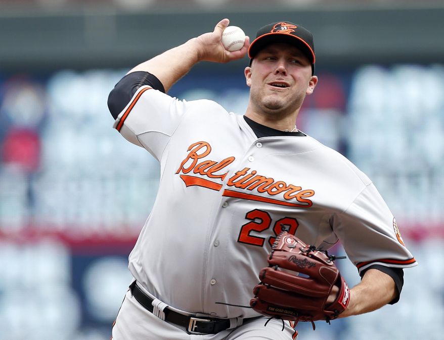 FILE - In this July 8, 2015, file photo, Baltimore Orioles pitcher Tommy Hunter throws against the Minnesota Twins in a baseball game in Minneapolis. Hunter and the Cleveland Indians have agreed to a one-year contract. A 29-year-old right-hander, Hunter was 4-2 with a 4.18 ERA in 58 relief appearances for Baltimore and the Chicago Cubs, who acquired him on July 31 for outfielder Junior Lake. (AP Photo/Jim Mone, File)