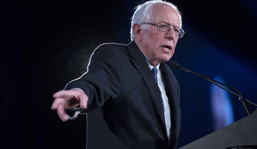 Democratic presidential candidate Sen. Bernie Sanders, I-Vt., speaks during the Jefferson Jackson Dinner, on Saturday, Feb. 13, 2016, in Denver. (AP Photo/Evan Vucci)