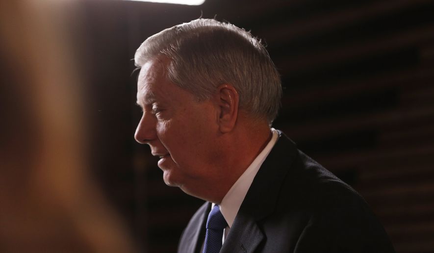U.S. Sen Lindsey Graham, R-S.C., speaks to the media before the CBS News Republican presidential debate at the Peace Center, Saturday, Feb. 13, 2016, in Greenville, S.C. Graham spoke about the death of Supreme Court Justice Antonin Scalia who died today at 79.  (AP Photo/John Bazemore)