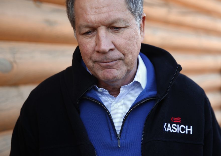 Republican presidential candidate, Ohio Gov. John Kasich listens to a question during a campaign stop, Saturday, Feb. 13, 2016, in Mauldin, S.C. (AP Photo/Paul Sancya)
