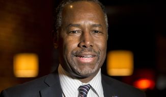 Republican presidential candidate Ben Carson speaks to members of the media before a Valentine&#39;s Day dinner with his wife and a group of doctors during a private event at the Blue Marlin restaurant in Columbia, S.C., Sunday, Feb. 14, 2016. (AP Photo/Jacquelyn Martin)