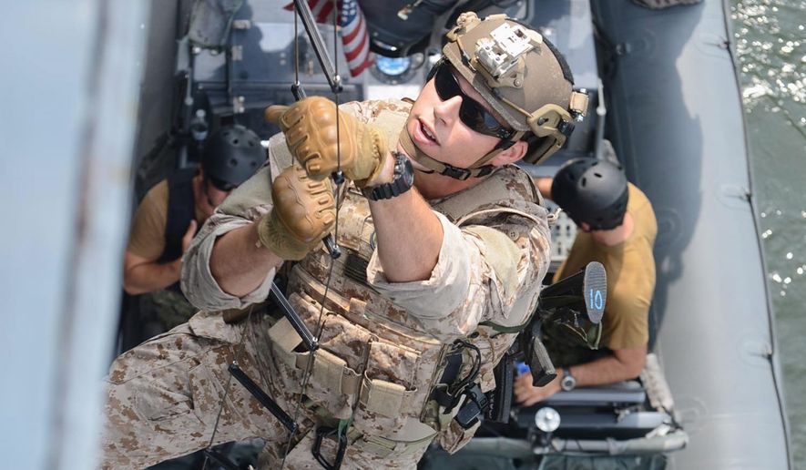A new report on female integration into the U.S. special armed forces found the male-dominated warrior culture may be adversely affected. (U.S. Navy)