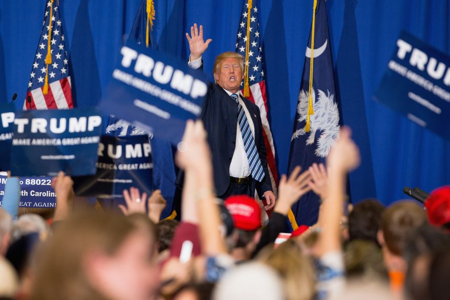 Republican presidential candidate Donald Trump waves after speaking at a rally at the Riverview Park Activity Center in North Augusta, S.C., Tuesday, Feb. 16, 2016. (AP Photo/Andrew Harnik)