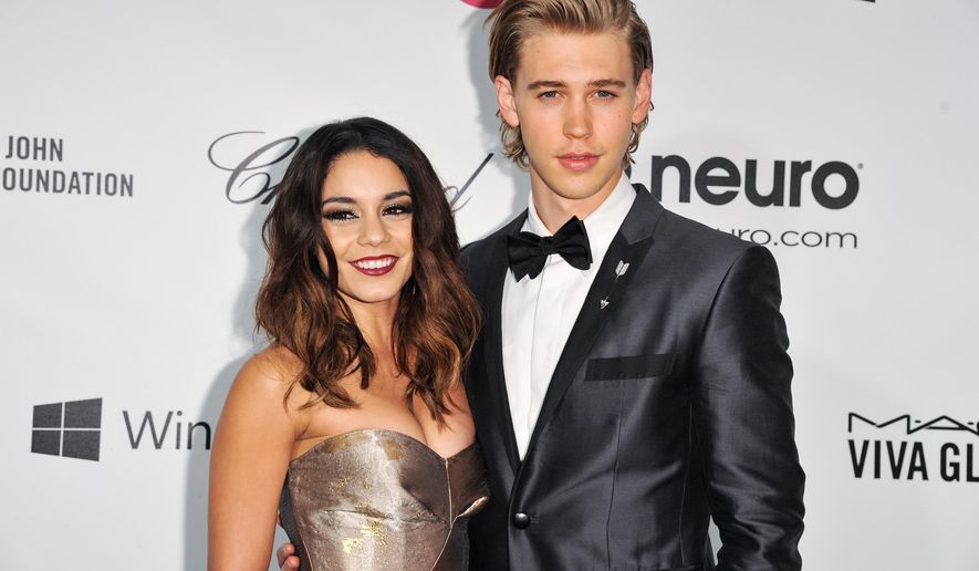 FILE - In this March 2, 2014 file photo, Vanessa Hudgens, left, and Austin Butler arrive at 2014 Elton John Oscar Viewing and After Party in West Hollywood, Calif. A heart carved into red rock on Valentine's Day is drawing the attention of Arizona authorities who are investigating to see if Hudgens is the culprit. Hudgens posted a photo of the carving, bearing the names Vanessa and Austin, on her Instagram page Sunday, Feb. 14, 2016, but later removed it. Other photos with the hash tag "sedonadreams" still appear on the site. (Photo by Richard Shotwell/Invision/AP, File)