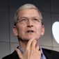 In this April 30, 2015, file photo, Apple CEO Tim Cook responds to a question during a news conference at IBM Watson headquarters, in New York. (AP Photo/Richard Drew, File)