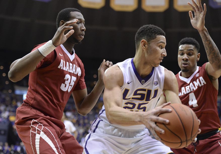 LSU forward Ben Simmons (25) looks to maneuver the ball away from Alabama forward Donta Hall (35) and Alabama guard Arthur Edwards (4) in the first half of their NCAA college basketball game in Baton Rouge, La., Wednesday, Feb. 17, 2016. (Hilary Scheinuk/The Advocate via AP) MAGS OUT; INTERNET OUT; NO SALES; TV OUT; NO FORNS; LOUISIANA BUSINESS INC. OUT (INCLUDING GREATER BATON ROUGE BUSINESS REPORT, 225, 10/12, INREGISTER, LBI CUSTOM); MANDATORY CREDIT