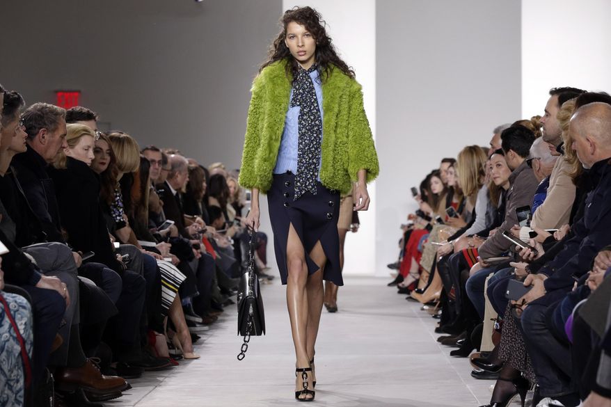 The Michael Kors Fall 2016 collection is modeled during Fashion Week in New York, Wednesday, Feb. 17, 2016. (AP Photo/Richard Drew)