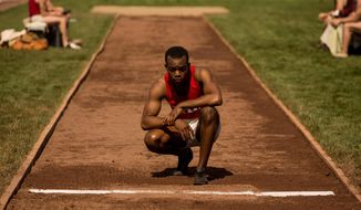 This photo provided by Focus Features shows Stephan James as Jesse Owens in Stephen Hopkins’ &amp;quot;Race,&amp;quot; a Focus Features release. The movie opens in theaters Friday, Feb. 19, 2016.  (Thibault Grabherr/Focus Features via AP)