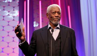 IMAGE DISTRIBUTED FOR AARP - Morgan Freeman accepts the Best Grownup Love Story award at AARP&#39;s 15th Annual Movies for Grownups Awards at the Beverly Wilshire Hotel on Monday, Feb. 8, 2016, in Beverly Hills, Calif. (Photo by Matt Sayles/Invision for AARP/AP Images)