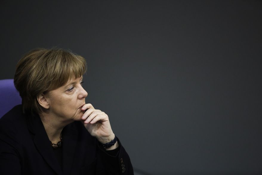 German Chancellor Angela Merkel listens to the debate after her speech a day before an EU council meeting, at the German parliament Bundestag in Berlin, Germany, Wednesday, Feb. 17, 2016. Merkel said that it’s in Germany’s national interest for Britain to remain in the European Union, and pressed her fellow European leaders to work with Turkey to curb the migrant influx. (AP Photo/Markus Schreiber)