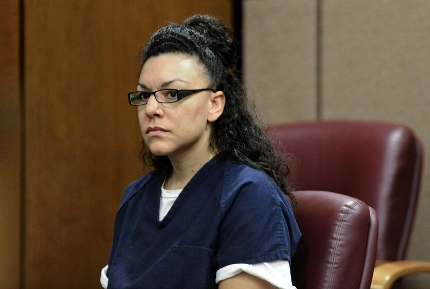 In this July 23, 2015, file photo, Dynel Lane, accused of attacking Michelle Wilkins and cutting the Longmont woman's unborn child from her womb, is arraigned on attempted-murder charges in Boulder District Court in Boulder, Colo. (Matthew Jonas/The Daily Times Call via AP, File)