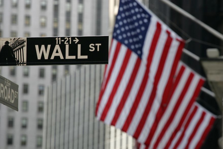 A Wall Street sign is shown in New York in this Sept. 17, 2008, file photo. (AP Photo/Mark Lennihan)