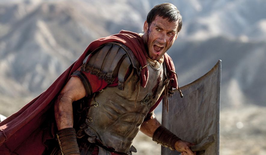 In this image provided by Columbia Pictures, Joseph Fiennes as Clavius leads his Roman soldiers during the zealot battle in Columbia Pictures' "Risen." The movie opens in U.S. theaters nationwide Feb. 19, 2016. (Rosie Collins/Columbia Pictures via AP)