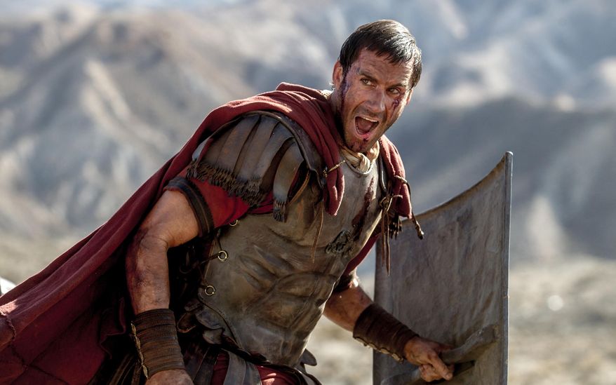 In this image provided by Columbia Pictures, Joseph Fiennes as Clavius leads his Roman soldiers during the zealot battle in Columbia Pictures' "Risen." The movie opens in U.S. theaters nationwide Feb. 19, 2016. (Rosie Collins/Columbia Pictures via AP)