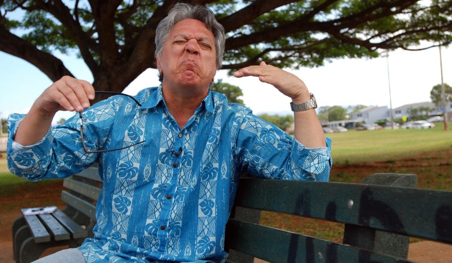 In this Jan. 28, 2016 photo, comedian Andy Bumatai gestures during an interview in Mililani, Hawaii. News reports on census data showing the number of Pidgin speakers in Hawaii have helped spark a sense of pride among those who speak the language in their homes. (AP Photo/Audrey McAvoy)