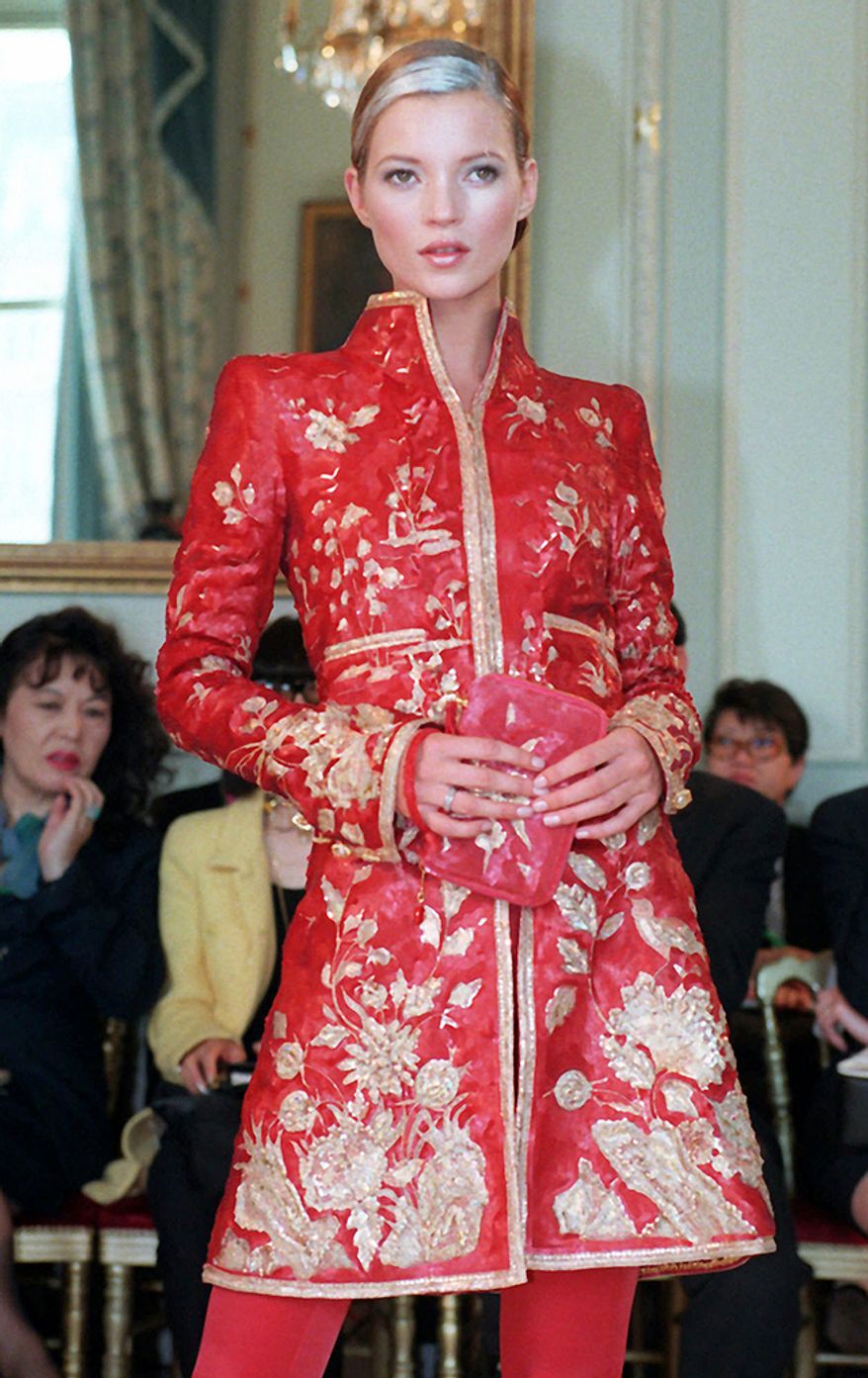 Kate Moss (born 16 January 1974) is an English model. Born in Croydon, Greater London, she was discovered in 1988 at age 14 by Sarah Doukas, founder of Storm Model Management, at JFK Airport inNew York City. Moss rose to fame in the early 1990s as part of the heroin chic fashion trend. She is known for her waifish figure, and role in size zero fashion. She received an award at the 2013 British Fashion Awards to acknowledge her contribution to fashion over 25 years. Moss has had her own clothing range and has been involved in musical projects. She has won accolades for modelling. In 2007, TIME named her one of the world's 100 most influential people. She has inspired cultural depictions including a £1.5m ($2.8m) 18 carat gold statue of her, sculpted in 2008 for a British Museum exhibition. She began dating Jefferson Hack in the early 2000s and they have a daughter, Lila Grace Moss Hack. She later dated musician Pete Doherty. She is married to Jamie Hince, guitarist for the Kills. She received media scrutiny for her party lifestyle and drug use. Drug allegations beginning in late 2005 led to her being dropped from fashion campaigns. She was cleared of charges and resumed modeling. In 2012, she came second on the Forbes top-earning models list, with estimated earnings of $9.2 million in one year. Earnings estimated at $50 million. (AP Photo/Lionel Cironneau)