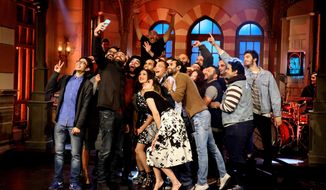This Tuesday, Feb. 16, 2016 photo provided by OSN, shows actors taking a &#39;selfie&#39; at the end of OSN&#39;s &amp;quot;Saturday Night Live Arabia,&amp;quot; show in Cairo, Egypt. Saturday Night Live is coming this Saturday to the Middle East ‘in Arabic’ with fresh material written for the region’s cultures and sense of humor. (OSN via AP) MANDATORY CREDIT