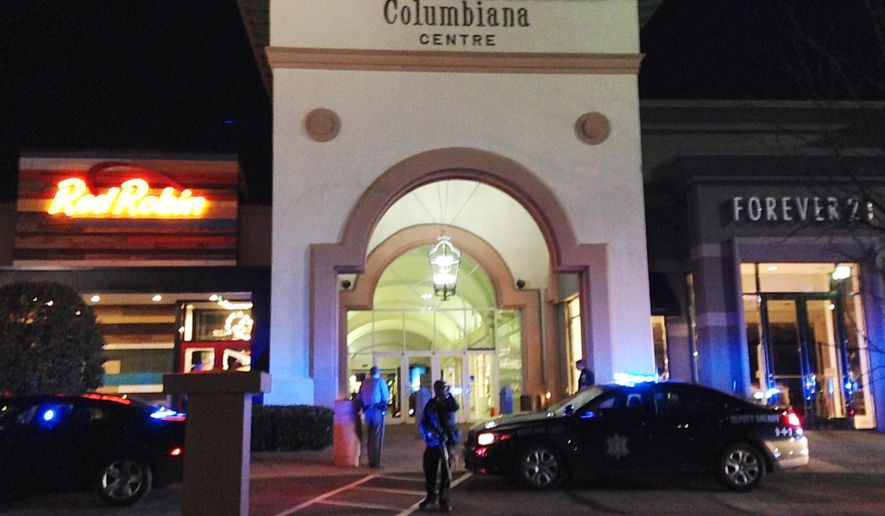 Authorities in South Carolina respond to reports of shots fired at the the Columbiana Centre mall in the suburbs outside Columbia. The mall is about a dozen miles outside the capital city’s downtown, where three of the six remaining Republican presidential candidates were holding primary-watch parties on Saturday night. (AP Photo/Jeffrey Collins)