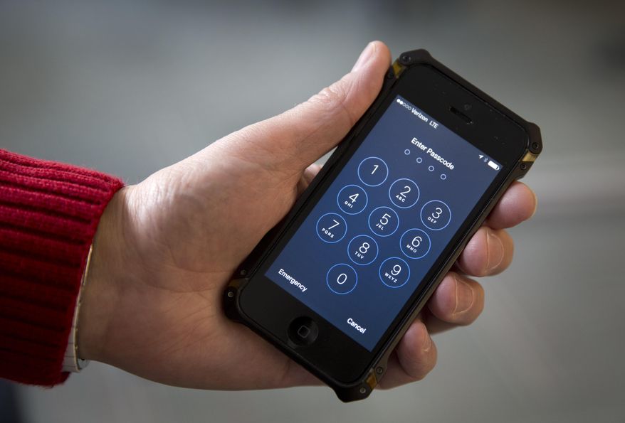 The San Bernardino County-owned iPhone at the center of an unfolding high-profile legal battle between Apple Inc. and the U.S. government lacked a device management feature bought by the county that, if installed, would have allowed investigators easy and immediate access. (Associated Press)