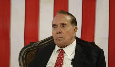 Former Kansas Sen. Bob Dole speaks during a campaign stop for Republican Sen. Pat Roberts at a mall Monday, Sept. 22, 2014, in Dodge City, Kan. (AP Photo/Charlie Riedel) ** FILE **