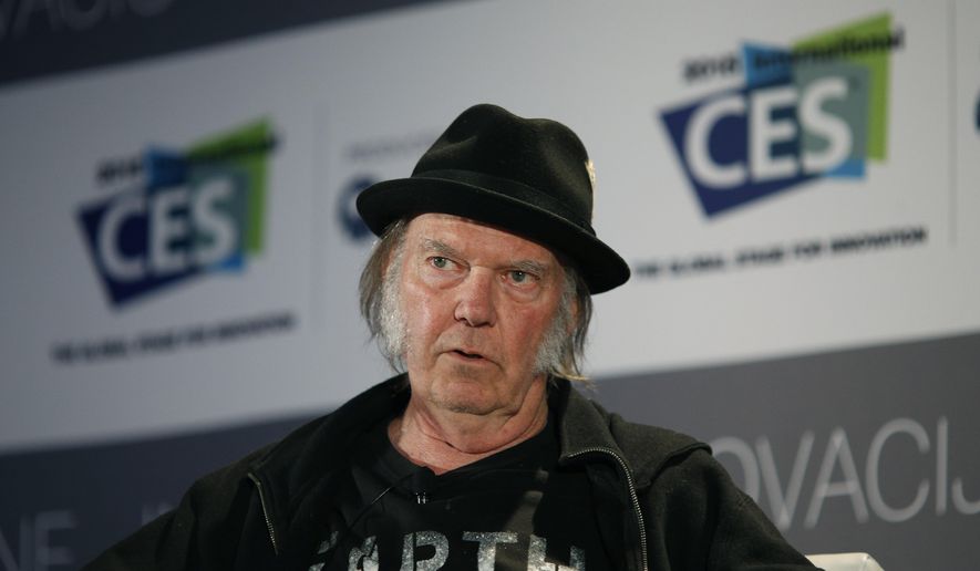 In this Jan. 7, 2015 file photo, musician Neil Young speaks in Las Vegas. (AP Photo/John Locher, File)