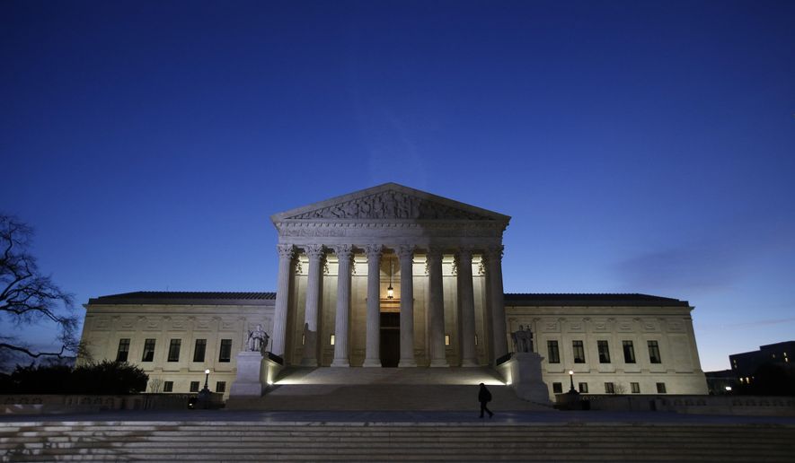 The front of the U.S. Supreme Court is seen early Friday, Feb. 19, 2016 in Washington.  Republican opposition to letting President Barack Obama replace Antonin Scalia quickly sparked a constitutional clash over the president’s right to fill Supreme Court vacancies.  (AP Photo/Alex Brandon)