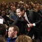 Republican presidential candidate, Sen. Marco Rubio, R-Fla., reaches into the crowd to shake hands at a campaign rally Tuesday, Feb. 23, 2016, in Minneapolis.  (AP Photo/Jim Mone)