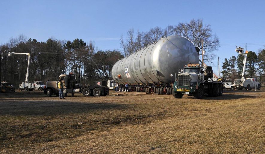 In this Thursday, Feb. 11, 2016 photo provided by the Louisiana National Guard, a controlled burn chamber arrives at Camp Minden in Minden, La. The National Guard is preparing to start a privately contracted $32 million cleanup to destroy millions of pounds of dangerous materials by burning it over the course of a year. (Sgt. Noshoba Davis/Louisiana National Guard via AP)