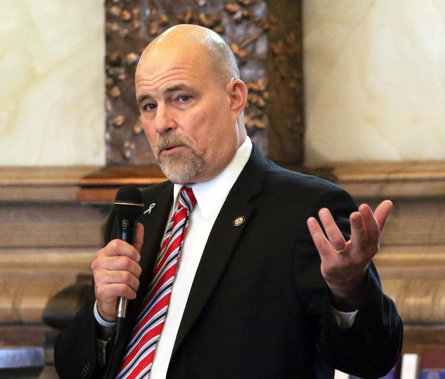 Sen. Greg Smith, an Overland Park, Republican and chairman of the Senate's corrections committee speaks, Tuesday, Feb. 23, 2016 in Topeka, Kan. Kansas senators on Tuesday voted to overhaul the juvenile justice system by offering community-based programs instead of jail for low-risk juvenile offenders. (Thad Allton/The Topeka Capital-Journal via AP) MANDATORY CREDIT