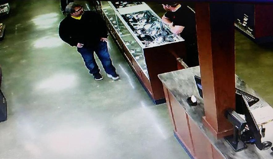 In this Saturday, Feb. 20, 2016 photo provided by Southwick's gun store, Jason Dalton, left, appears in the store in Plainwell, Mich., hours before he went on a shooting rampage. Dalton admitted to gunning down randomly chosen victims in and around Kalamazoo, Mich., — attacks apparently carried out over hours during which he also ferried passengers around town as an Uber driver. (Southwick's Gun Store via AP)