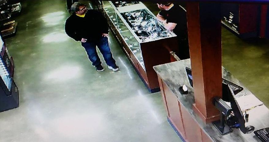 In this Saturday, Feb. 20, 2016 photo provided by Southwick's gun store, Jason Dalton, left, appears in the store in Plainwell, Mich., hours before he went on a shooting rampage. Dalton admitted to gunning down randomly chosen victims in and around Kalamazoo, Mich., — attacks apparently carried out over hours during which he also ferried passengers around town as an Uber driver. (Southwick's Gun Store via AP)