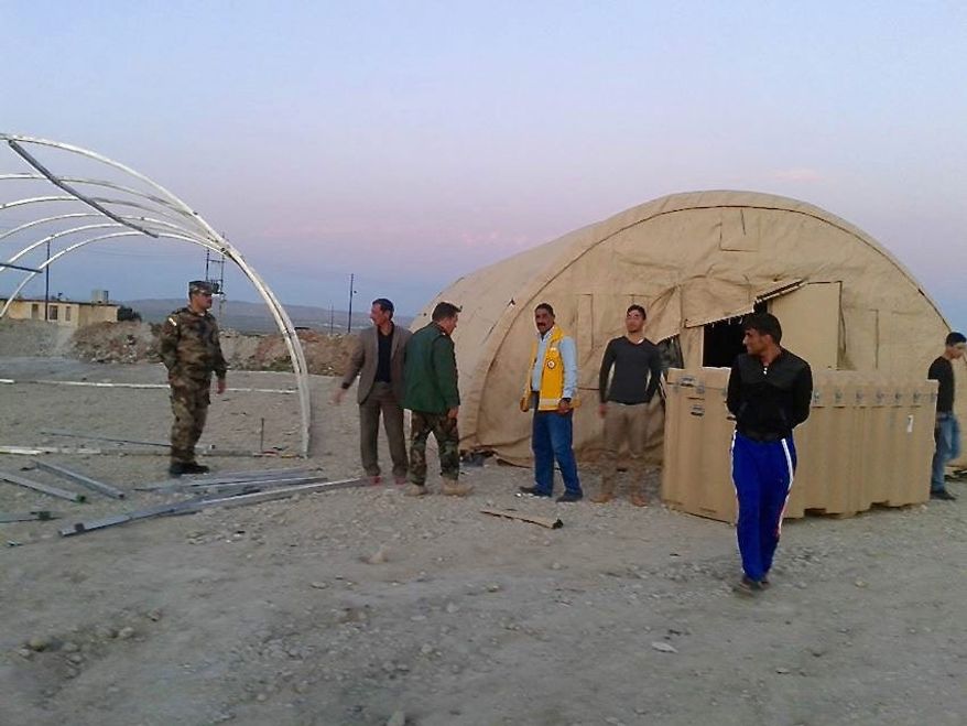 A field hospital set up by American volunteers in Northern Iraq on Feb. 9 opened just in time to take in 12 Kurdish peshmerga hit by Islamic State mortar shells carrying chemical munitions. They are part of the Qalubna Makum, Arabic for "Our hearts are with you."