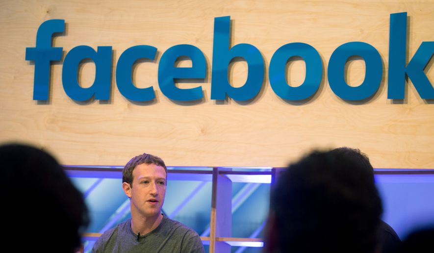 Facebook CEO Mark Zuckerberg speaks during a visit to a Facebook Innovation Hub in Berlin on Feb. 25, 2016. Zuckerberg presented studies on Artificial Intelligence. (Kay Nietfeld/dpa via AP) **FILE**