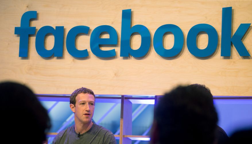 Facebook CEO Mark Zuckerberg speaks during a visit to a Facebook Innovation Hub in Berlin on Feb. 25, 2016. Zuckerberg presented studies on Artificial Intelligence. (Kay Nietfeld/dpa via AP) **FILE**