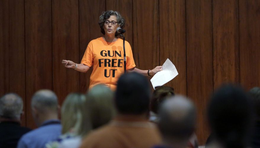 FILE - In a Wednesday, Sept. 30, 2015 file photo, Professor Joan Neuberger speaks during a public forum on how to implement a new law allowing students with concealed weapons permits to carry firearms into class and other campus buildings, in Austin, Texas. Some faculty members at the University of Houston say sensitive subjects may become taboo in their classrooms because of a law allowing Texas public university students to bring guns to class. The law takes effect in August 2016. (AP Photo/Eric Gay, File)