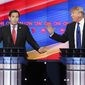 Republican presidential candidates, Sen. Marco Rubio, R-Fla, left, and businessman Donald Trump argue while answering a question during the Republican Presidential Primary Debate at the University of Houston Thursday, Feb. 25, 2016. (AP Photo/Houston Chronicle, Gary Coronado, Pool) 