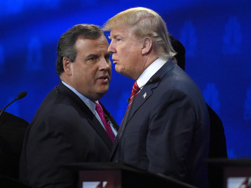 In this Oct. 28, 2016, photo, New Jersey Gov. Chris Christie and Donald Trump talk during a break in the CNBC Republican presidential debate at the University of Colorado in Boulder, Colo. (AP Photo/Mark J. Terrill) **FILE**