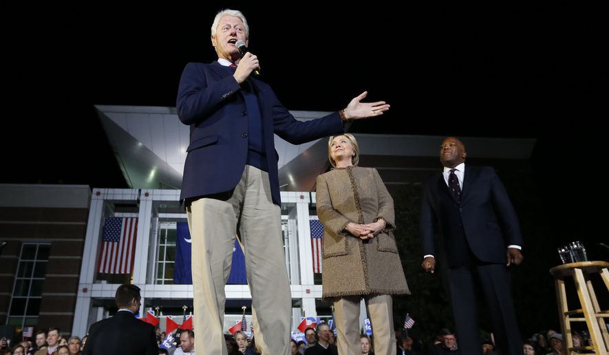 Democratic presidential candidate Hillary Clinton and her husband, former President Bill Clinton, speak at a &quot;Get Out The Vote Rally&quot; in Columbia, S.C., Friday, Feb. 26, 2016. (AP Photo/Gerald Herbert)