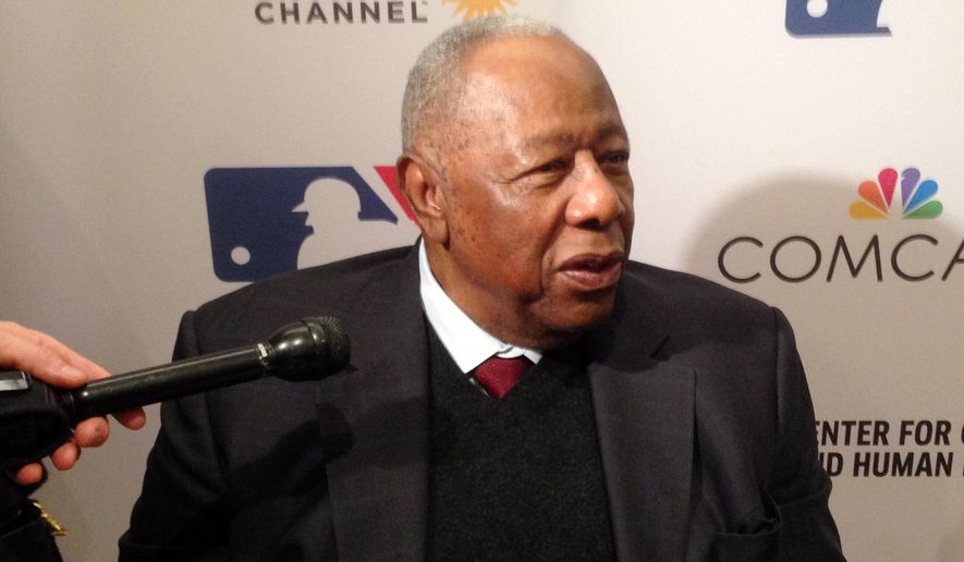 In this Feb. 5, 2016 photo, Atlanta Braves Hall of Famer Hank Aaron speaks in Atlanta, Ga. Aaron attended the screening of the film &amp;quot;The Hammer of Hank Aaron&amp;quot; which will premiere on the Smithsonian Channel on Monday, Feb. 29, 2016. (AP Photo/Charles Odum)
