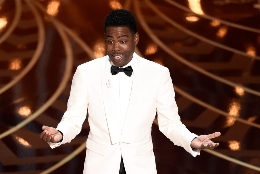Host Chris Rock opened the Oscars Sunday on the controversy sparked by all 20 nominated actors being white for the second consecutive yar, touching on the matter while also attempting to make light of it, saying "I'm here at the Academy Awards, otherwise known as the White People's Choice Awards." (Associated Press Photographs)