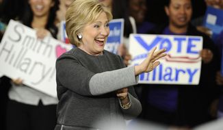 Democratic presidential candidate Hillary Clinton waves to the audience at a campaign event, Monday, Feb. 29, 2016, in Springfield, Mass. (AP Photo/Jessica Hill)