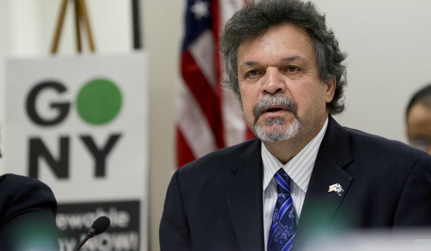 Assemblyman Felix Ortiz, D-Brooklyn, speaks during a public forum on climate change on Monday, Feb. 29, 2016, in Albany, N.Y. Nearly two dozen state lawmakers want New York's public pension fund to drop stock holdings in oil, natural gas and coal companies as part of a movement against global warming. (AP Photo/Mike Groll)