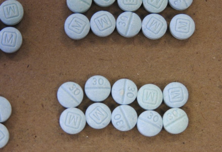 This undated photo provided by the Cuyahoga County Medical Examiner’s Office shows fentanyl pills. (Cuyahoga County Medical Examiner’s Office via AP) ** FILE **