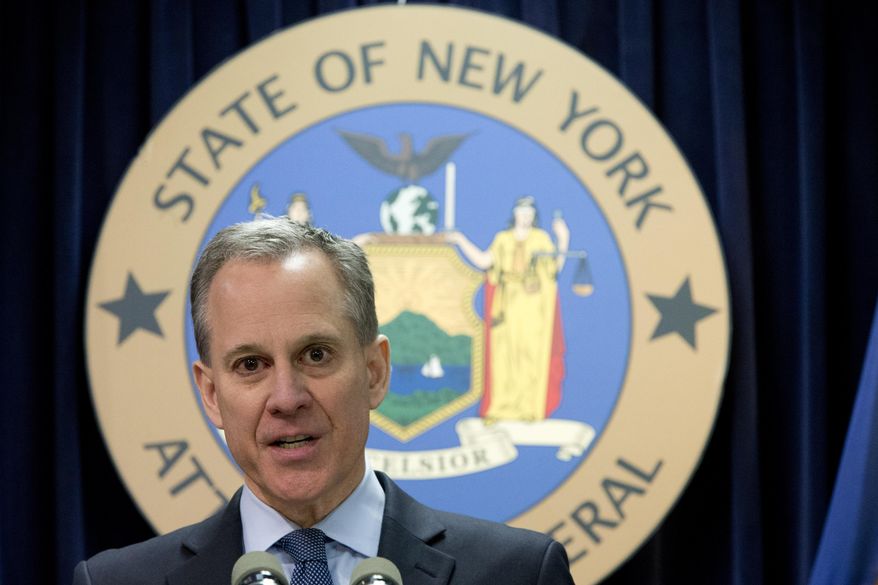 New York Attorney General Eric T. Schneiderman speaks during a news conference in New York on Feb. 11, 2016. (Associated Press) **FILE**