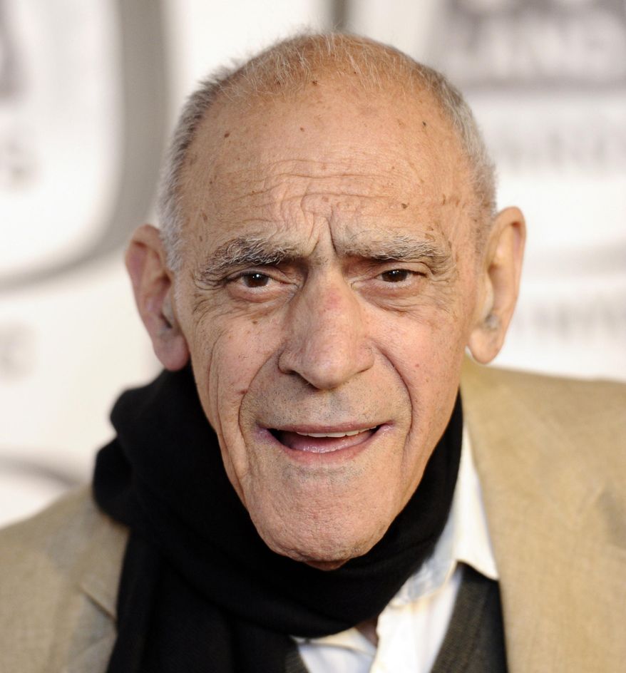 FILE - In an April 10, 2011, file photo, actor Abe Vigoda arrives at the 2011 TV Land Awards in New York. Famously long rumored to be dead, beloved character actor Vigoda died for real in January 2016 at age 94. But the Academy of Motion Picture Arts and Sciences didn’t seem to notice. In any case, it omitted Vigoda from the "In Memoriam" package on Sunday, Feb. 28, 2016 during the Oscars, and his daughter is incensed. (AP Photo/Peter Kramer, File)