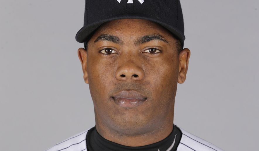 FILE - This is a 2016 file photo showing Aroldis Chapman of the New York Yankees baseball team. Aroldis Chapman agreed to accept a 30-game suspension under Major League Baseball’s domestic violence policy, a penalty stemming from an incident with his girlfriend last October.  Under the discipline announced Tuesday, March 1, 2016, Chapman will serve the penalty from the start of the season in April. (AP Photo/Chris O&#x27;Meara, File)