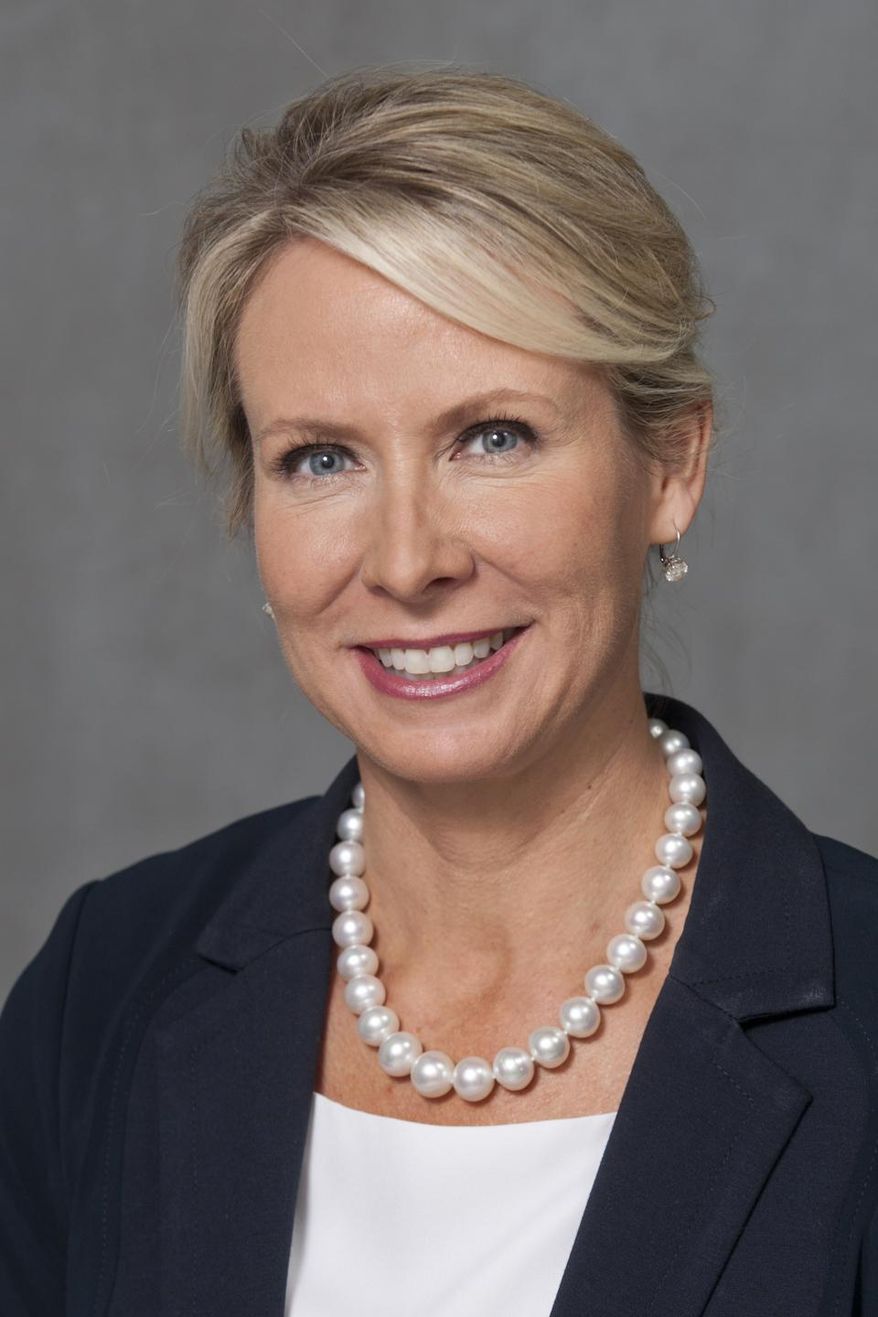 FILE- In this undated file photo provided by the Arkansas Secretary of State's office, Arkansas Supreme Court justice Courtney Goodson poses for a photo. Circuit Judge Dan Kemp won the race against Goodson to lead the Arkansas Supreme Court Tuesday, March 1, 2016, in a campaign that had been marked by a record amount of outside spending targeting his rival. (Jerry Davis/Arkansas Secretary of State via AP, File)
