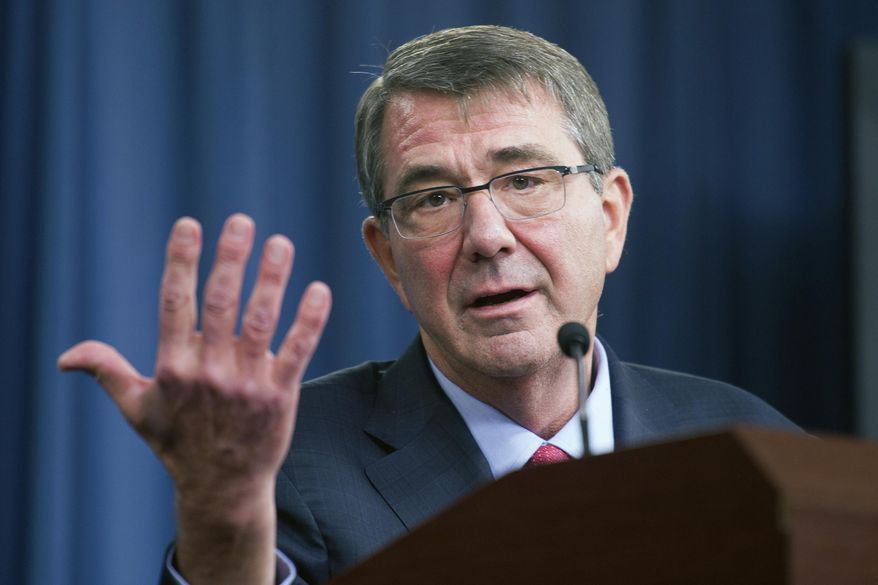In this Jan. 28, 2016 file photo, Defense Secretary Ash Carter gestures during a news conference at the Pentagon. (AP Photo/Cliff Owen, File)