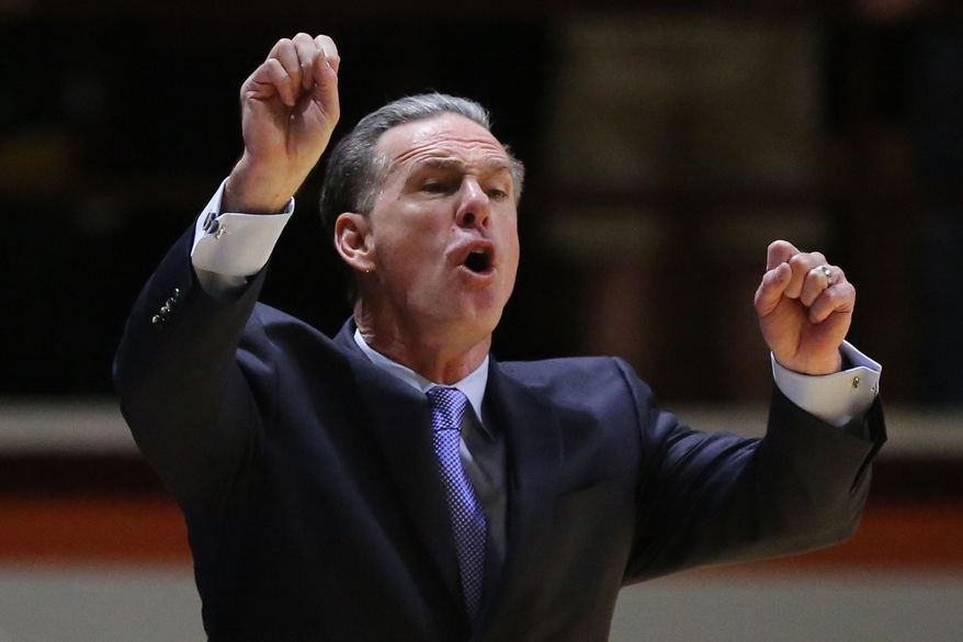 Pittsburgh head coach Jamie Dixon coaches from the sideline during the first half of an NCAA basketball game against Virginia Tech, Wednesday, March 2, 2016 in Blacksburg, Va. (Matt Gentry/The Roanoke Times via AP) LOCAL TELEVISION OUT; SALEM TIMES REGISTER OUT; FINCASTLE HERALD OUT;  CHRISTIANBURG NEWS MESSENGER OUT; RADFORD NEWS JOURNAL OUT; ROANOKE STAR SENTINEL OUT; MANDATORY CREDIT